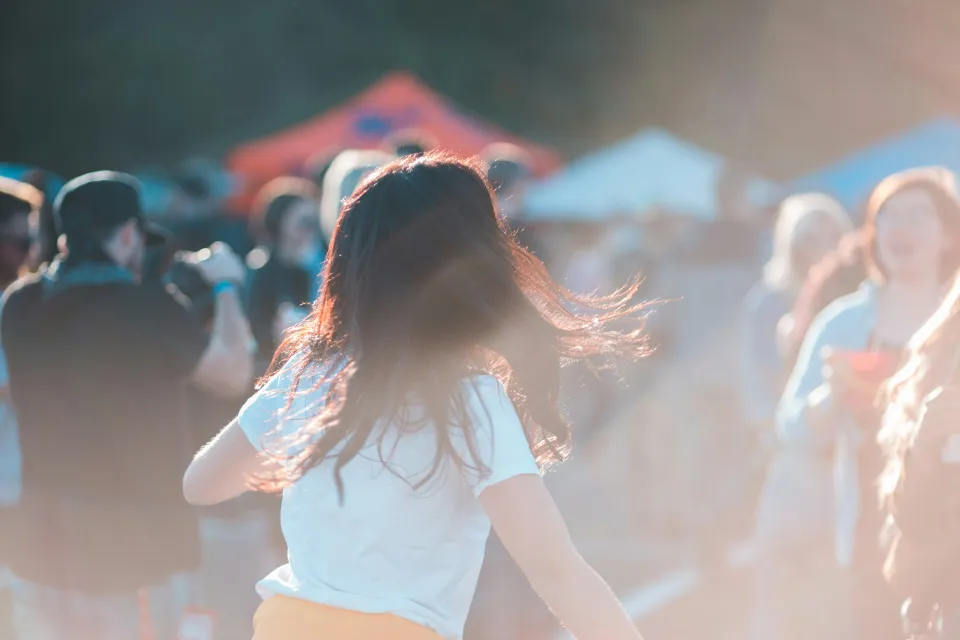 Child at a crowded festival